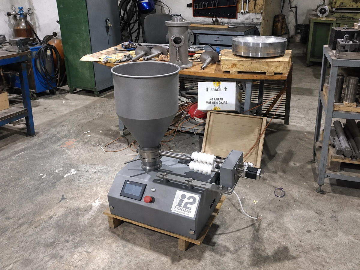 Assembled machine with hopper and forming rollers