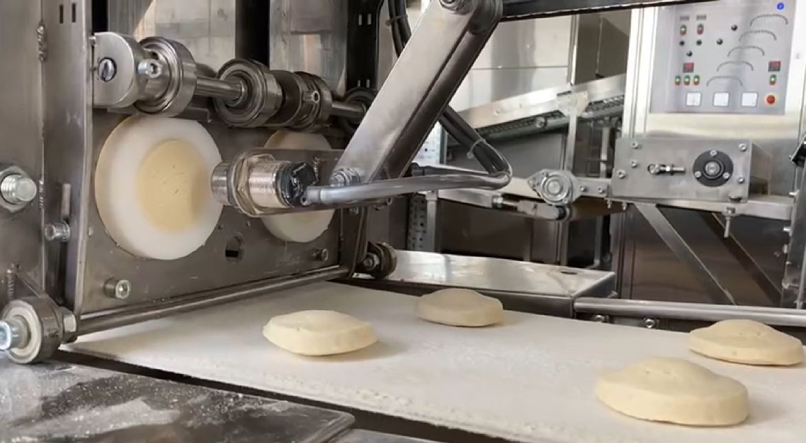 Dough divider for pita production line